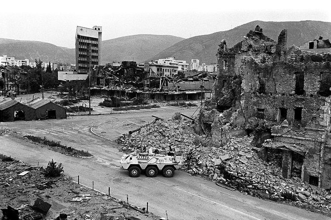 War Photo Exhibition Tour in Mostar - Entering the western tower above the divers’ club